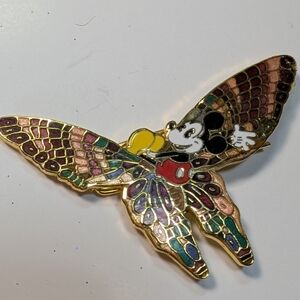 Wendy Gell Disney closinnie enamelMickey on a butterfly hair barrette.